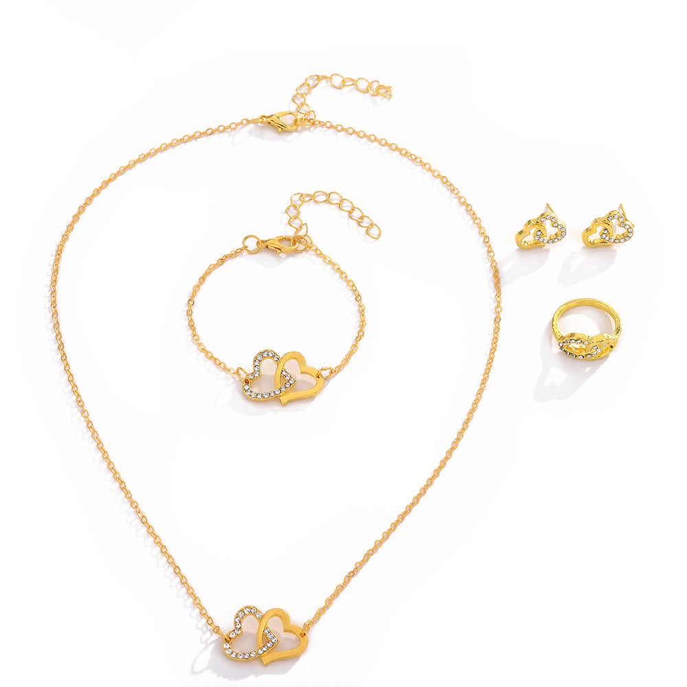 UNI-10557 - Gold Blinky Heart - Jewelry Set