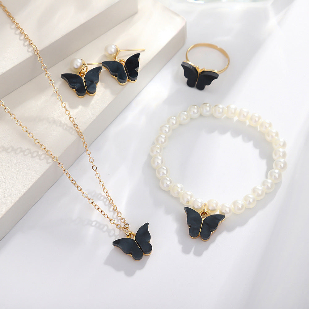 UNI-10556 - Black Butterfly Pearl Gold  - Jewelry Set